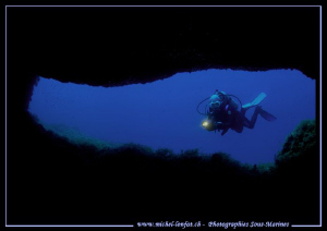 Caroline at the Entrance of a cave in Gozo Malta... Que d... by Michel Lonfat 
